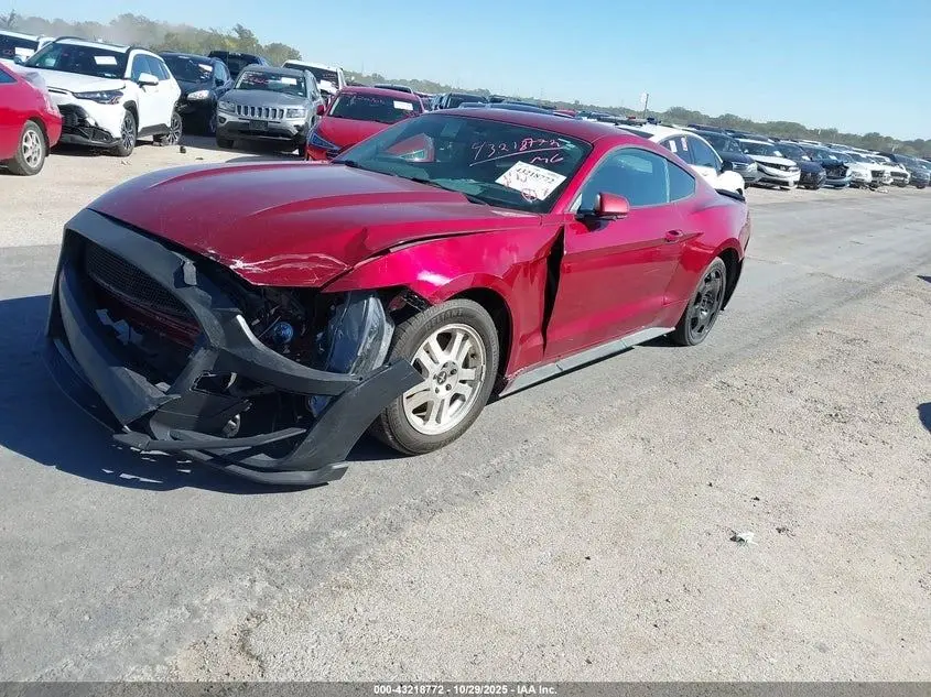 Red Mustang with heavy front-end damage